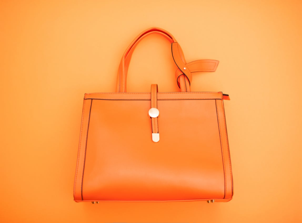 Orange Handbag On Orange Background